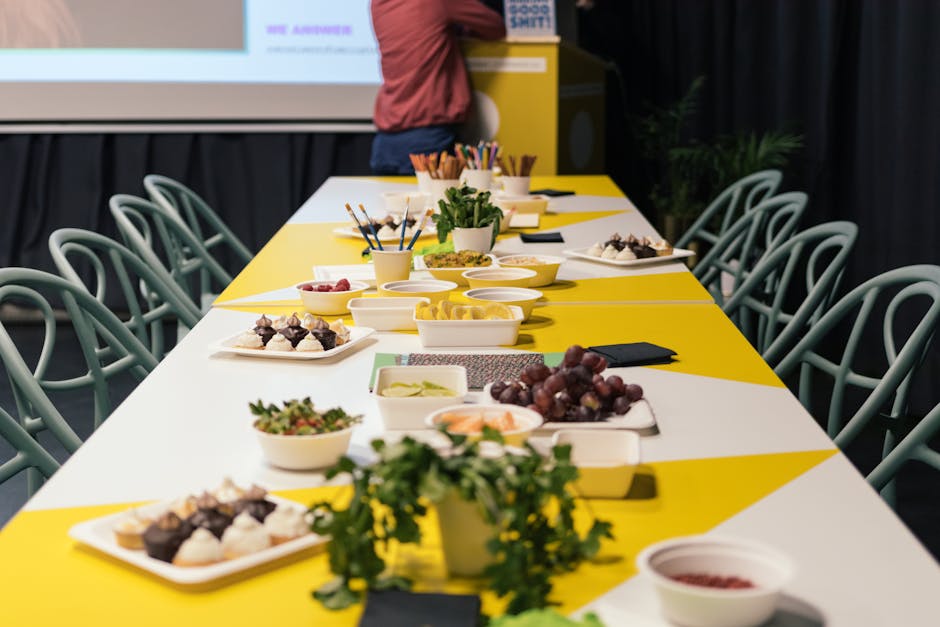 Community gathering around a long wooden table.